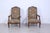 Elegant pair of armchairs design and production of the 1930s. Wooden structure, with comfortable armrests. Firal fabric...