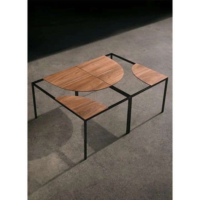 Set of 2 creek coffee table by Nendo Materials: Top: solid wood (Also available in Powder coated metal) Structure: black...