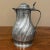 18th Century French Pewter Pitcher is an elaborately decorated example of fine craftsmanship in everyday items, using...