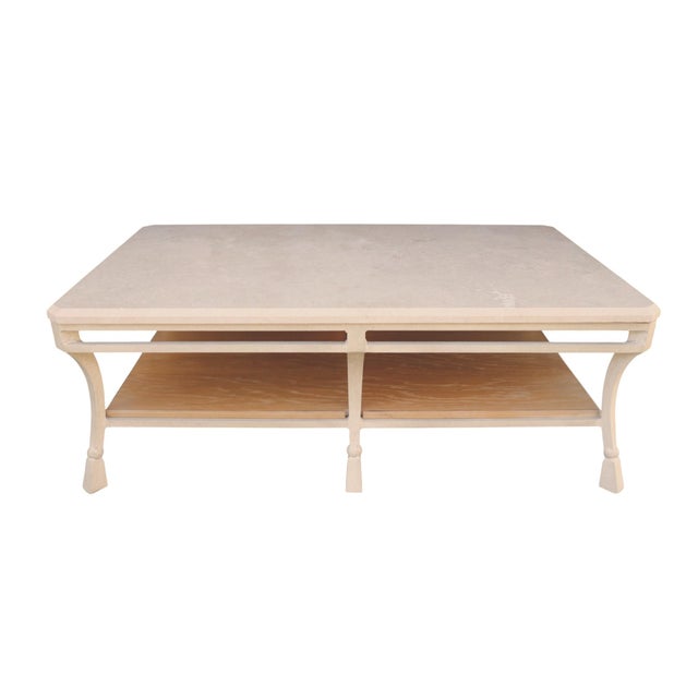 A substantial transitional style coffee table by Lexington Furniture Company. A honed and filled cream colored travertine...