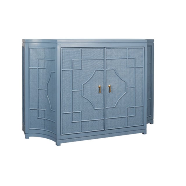 Elegant storage meets bohemian style with the Isabel two-door cabinet featuring a decorative Greek Key rattan overlay...