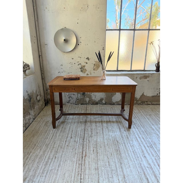 Antique small desk, work table, or draper's table in solid oak, dating from the 1900s. We love the molding work on the...