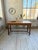 Antique small desk, work table, or draper's table in solid oak, dating from the 1900s. We love the molding work on the...