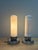 A striking and increasingly difficult-to-find matched pair of Art Deco Streamline Moderne accent lamps, dating to the...