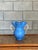 Beautiful earthenware vase in a stunning blue with handles. Great form and color. Beautiful piece that would work well in...