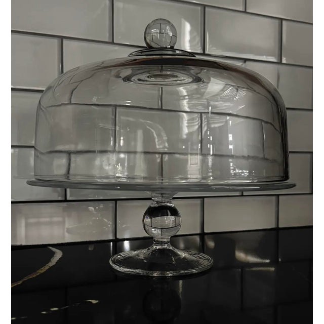 Elegant 1970s hand-blown glass cloche cake stand on pedestal, featuring a beautifully proportioned free-set dome (without...