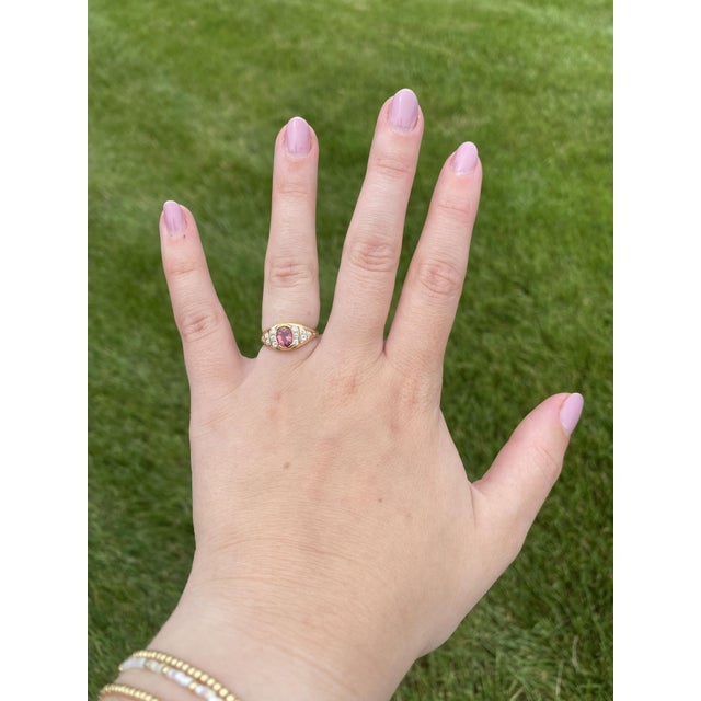 Stones: pink tourmaline, 1 stone oval cut 7 x 5 mm approximately 1 carat diamonds, 12 stones round brilliant cut 1.7 - 1.9...