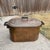late 19th-century Early American primitive copper boiler wash tub with its original dark-patinated matching lid. It...