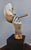This 1997 John Cutrone "Panama" sculpture by Austin Productions features a man smoking a cigar and is approximately 16...