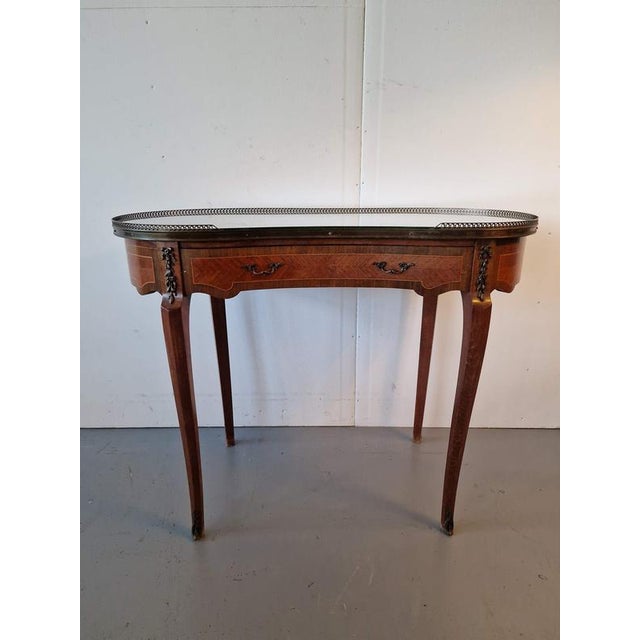 Ladies table.Mahogany veneer, inlays.France.1970s.Size: height 78cm; length 99cm; depth 48cm