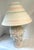 Beautiful table lamp with a sea shell design! Pretty! I have a floor lamp that matches this one in another listing