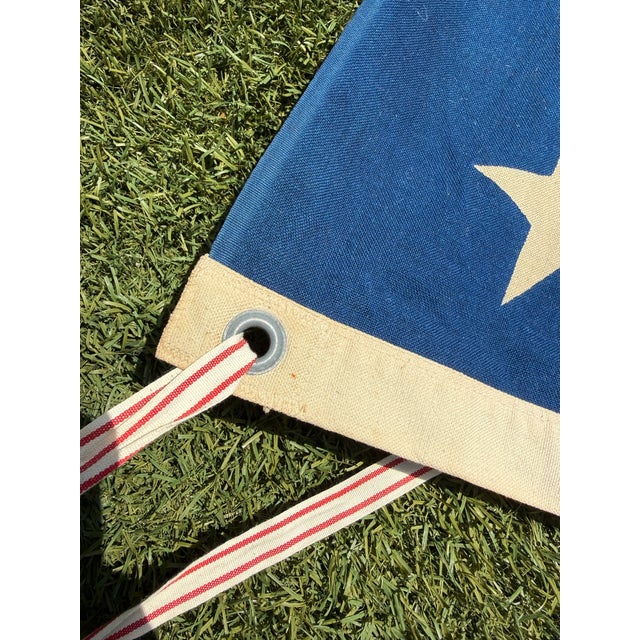 A striking antique American flag featuring the 48-star configuration, used from 1912 to 1959, spanning the WWI and WWII...