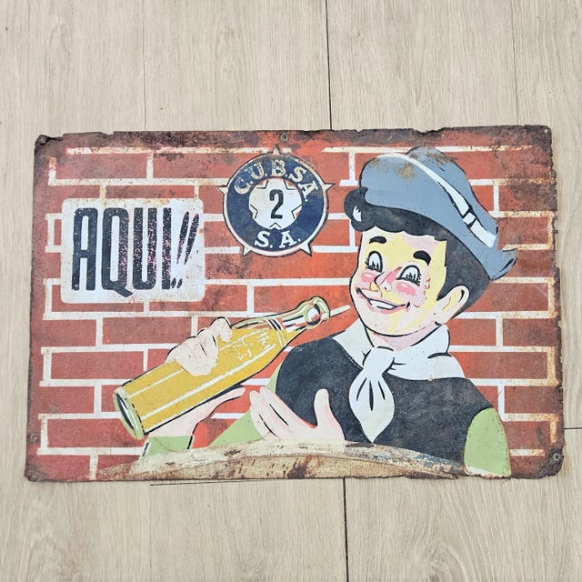 Hand-Painted Advertising Tin Sign by Aqui, 1920s For Sale - Image 6 of 6