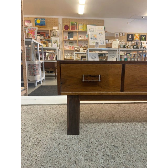 1970s Imported Vintage Danish Modern Walnut Toned Low Console Coffee Table With Wood Inlay. For Sale - Image 4 of 8