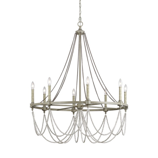 The Sean Lavin Beverly eight light single tier chandelier in French washed oak / distressed white wood supplies ample...