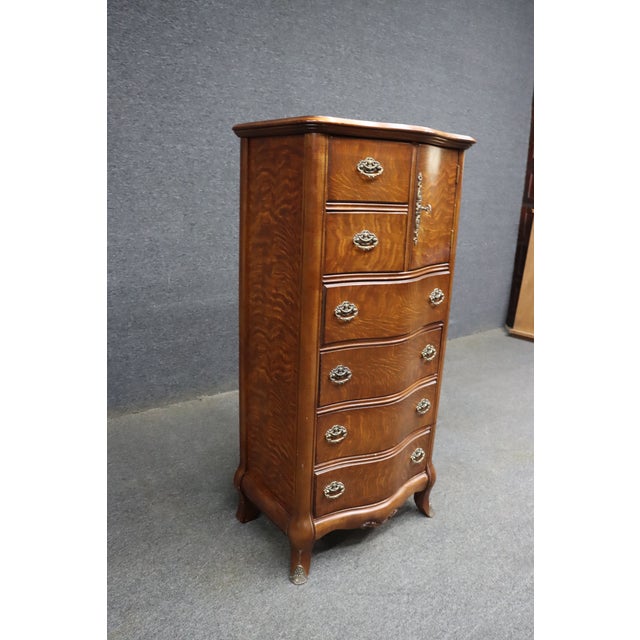 Pulaski Furniture Victorian-style lingerie chest crafted in quarter-sawn oak with highly figured oak grain throughout. The...