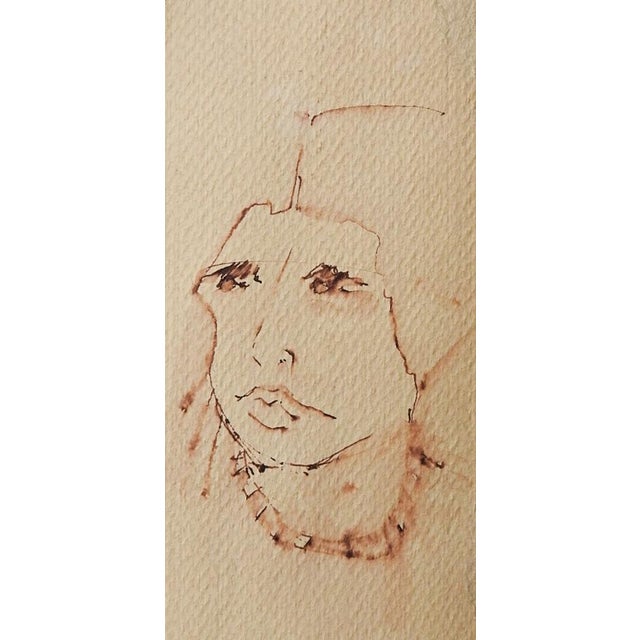 Mid 20th century sepia pen and ink on tan paper modernist portrait study of face. Unsigned. Unframed, mounted on cardstock...