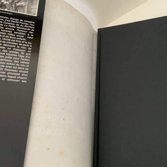 Noted French photographer Robert Doisneau with author Daniel Pennac. Les Grandes Vacances. Text in French. Oversized hard...