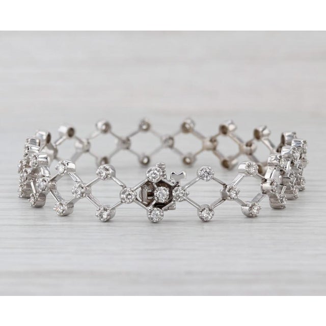 Gemstone Information: - Natural Diamonds - Total Carats - 1.70ctw Cut - Round Brilliant Color - F - H Clarity - SI2 - I1...