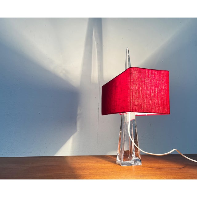 Imposing mid-century glass lamp from the French manufacturer Daum. This manufacturer is known for organically shaped glass...