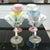 This six-piece martini glass set by the artist Jeing reflects late-20th-century studio production focused on celebratory,...