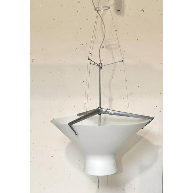 Opaline and aluminum pendant lamp, Juri model, by Lorenzo Stano, 1996. Very good condition. Works. This piece has an...