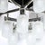 This striking Art Deco-style ten-arm chandelier, crafted in France during the 20th century, is an elegant lighting fixture...