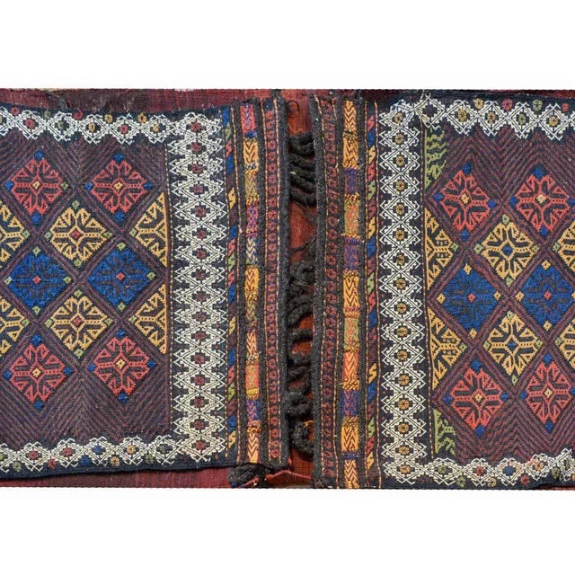 A wondeful early 20th century Persian Shahsevan flat-weave saddlebag with a fantastic multicolored diamond pattern...