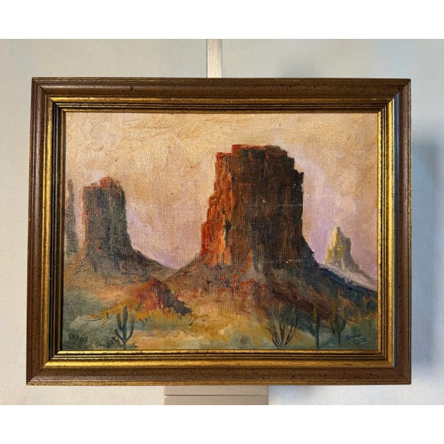An eye catching recreation of an American Southwest landscape is captured in this exquisitely executed original oil signed...