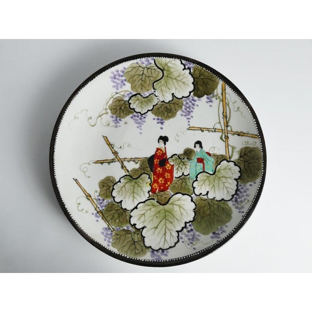 Meiji Hand-Painted Kutani Porcelain Charger with Women and Vine Arbor, 1920s For Sale - Image 17 of 18