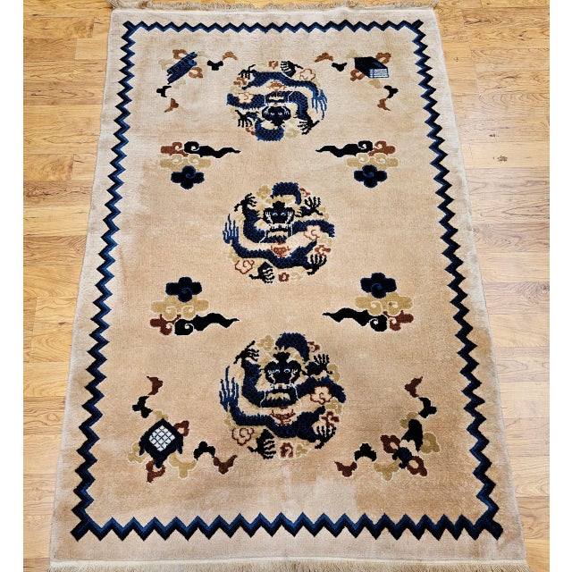 Vintage Chinese Art Deco area rug, a rare and refined piece that effortlessly merges cultural symbolism with timeless...
