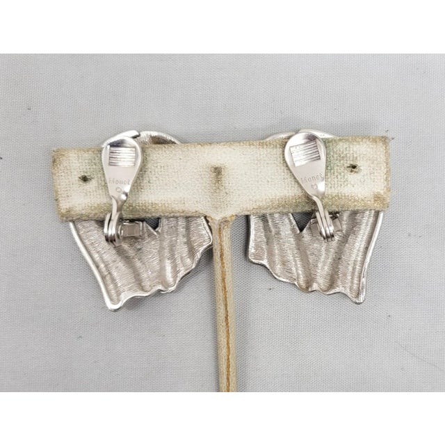 Silver Vintage 1980s Signed Monet Rhodium Plated Modernist Ribbon Clip Earrings - 2 Pieces For Sale - Image 8 of 8