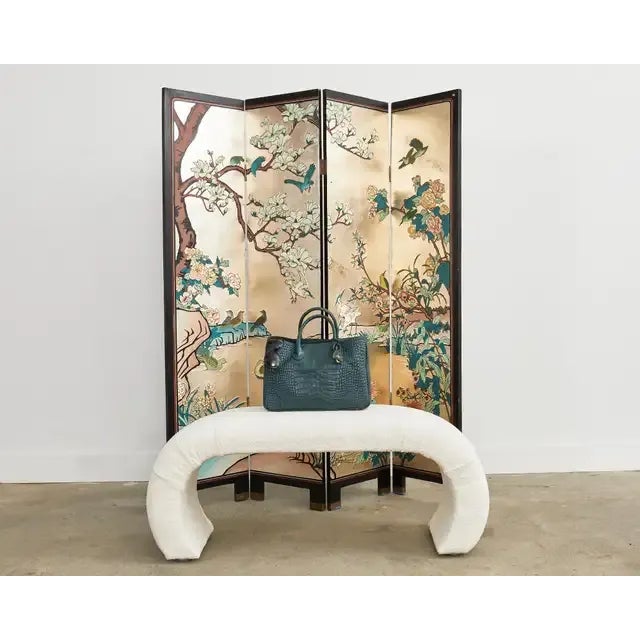 Iconic mid-century modern waterfall scroll bench made in the manner and style of Karl Springer. The bench has a modern...