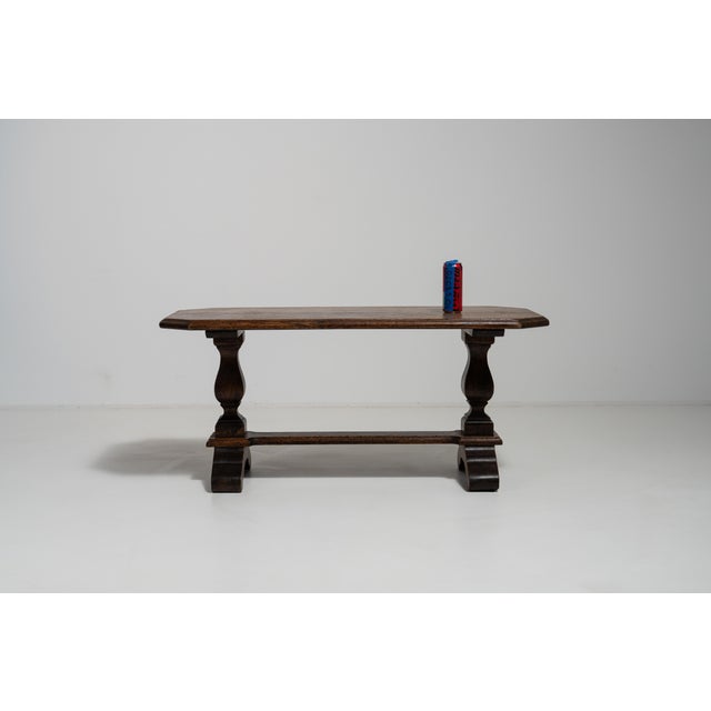 Rendered in richly grained oak, this French refectory coffee table from the 1970s draws on a centuries-old monastic...