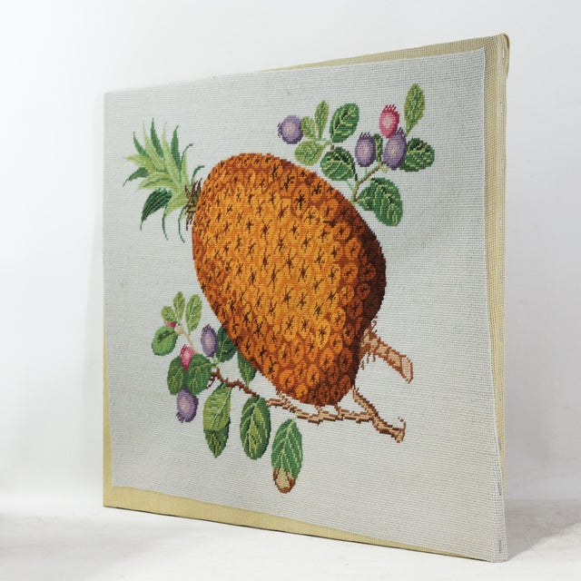 This striking vintage needlework piece features a meticulously botanical composition, showcasing a large, vibrant...