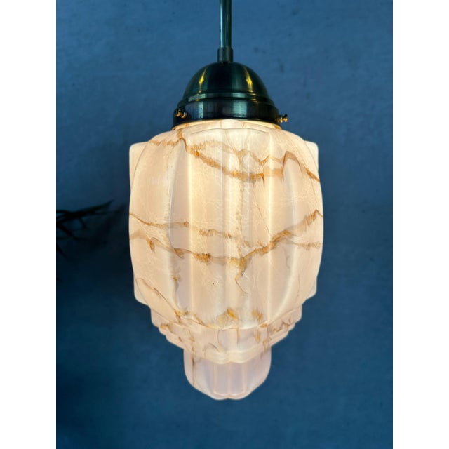 Beautiful Art Deco skyscraper. Rose opaline with amber flames. Brass fixture. Bakelite E27 socket. Rewired. Globe...