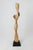 Carved from a single piece of wood, this tall abstract sculpture is a masterwork of organic fluidity. Its design features...