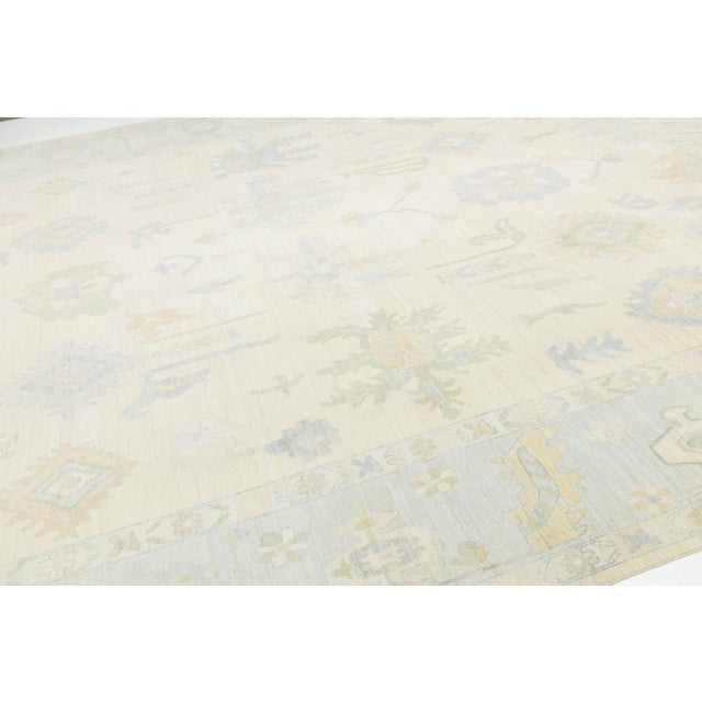 Artisanal Oushak Style Wool Area Rug: Neutral Ivory With Muted Floral Motifs For Sale - Image 4 of 11