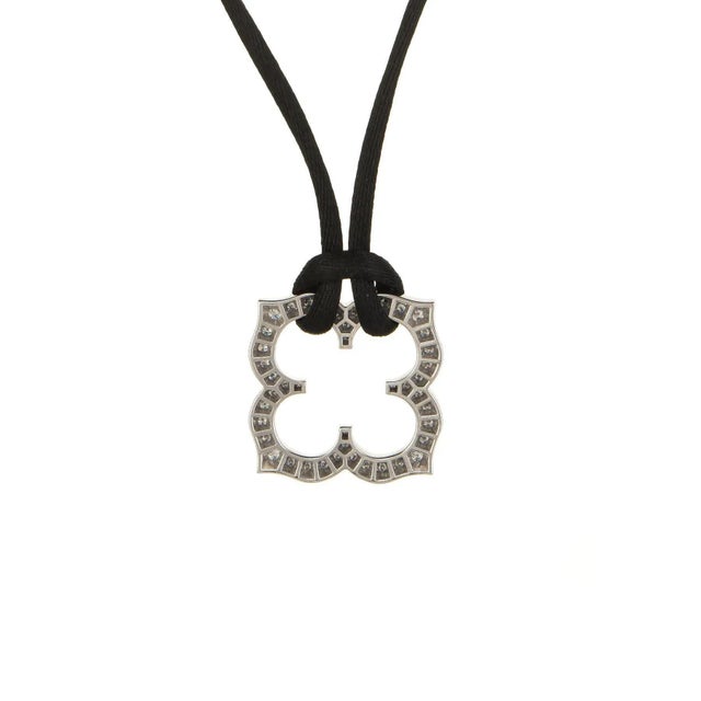 Finely detailed pre owned Cartier Hindu diamond necklace, crafted in 18 karat white gold. Round brilliant cut diamonds...