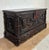 Impressive Spanish blanket chest crafted in solid oak, richly decorated with deep hand-carved panels and striking...