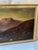 A beautiful vintage Hudson Valley studio oil on canvas painting of a mountain landscape with a river at dusk with pink...
