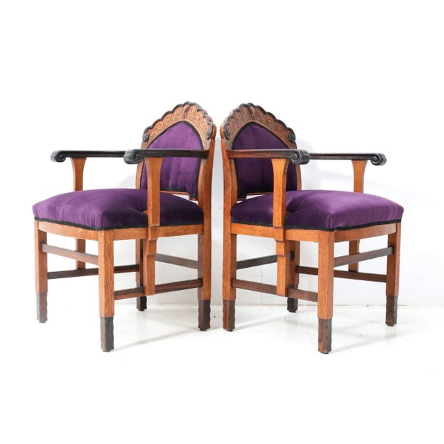 Magnificent and ultra rare set of two Art Deco Amsterdamse School armchairs. Design by unknown artist but in the manner of...