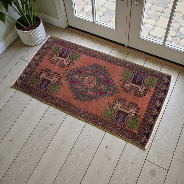 This vintage Konya piece brings a warm terracotta ground and bold geometric figures that instantly anchor an entryway with...