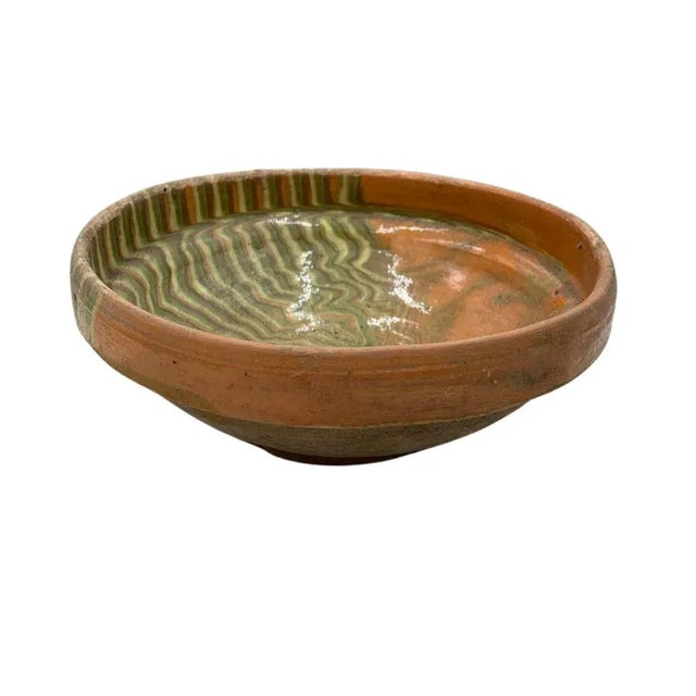This antique terra cotta decorative bowl from Hungary is a wonderful addition to any Farmhouse decor. The rustic piece...