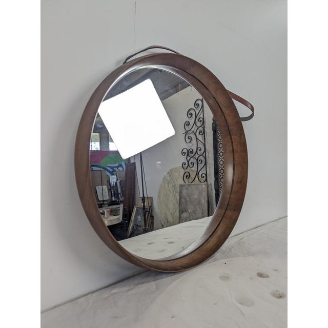 Round Mirror in Teak and Leather Luxus Vittsjö by Uno and Östen Kristiansson, 1960s, in Very Good conditions. Designed...