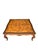Quick Hits: - Large burl wood square coffee table - Intricate book matched burl wood veneer with secondary wood edge band...