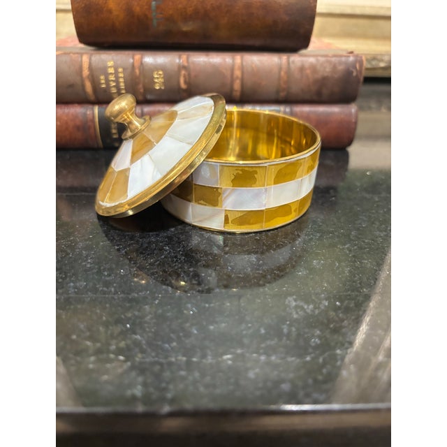 Offered is a precious trinket box made of real brass and mother of pearl. This petite accent trinket box adds instant...