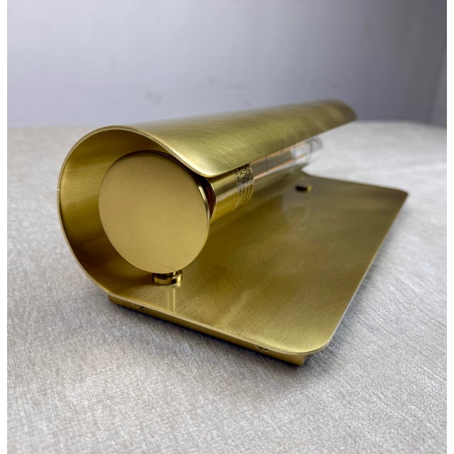 A gorgeous solid brass wall sconce in like new condition (open box display model). Retails at $546. We have two of these....