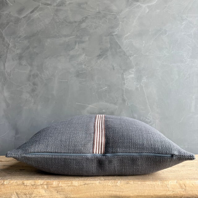 Libeco Jasper pillow with zipper closure. Main color is grey with cream and red stripes. Insert included. Size: 25" x 25...