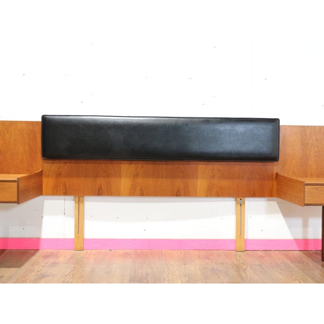 Discover the epitome of mid-century elegance with this stunning headboard set with bedside tables. Made by renowned...